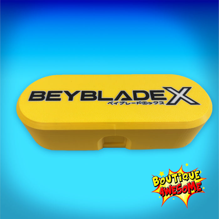BEYBLADE X, DECK CASE, Awesome Yellow X (rounded)  – Awesome Essentials